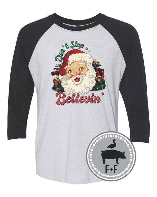 Don't Stop Believin Santa Christmas raglan shirt black