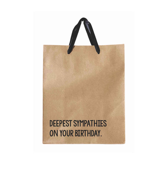 Deepest Sympathies On Your Birthday brown paper birthday gift bags featuring black print and a black ribbon handle